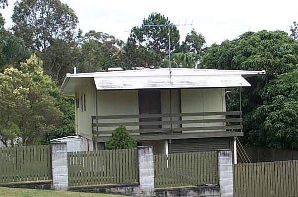 Original home exterior before transformation