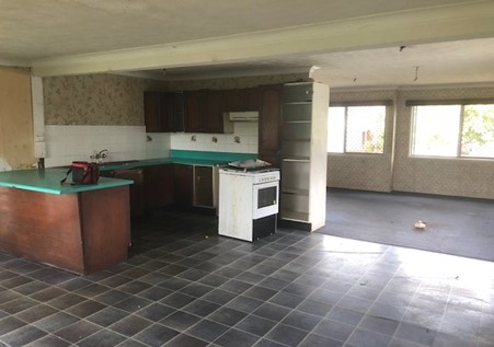 Original kitchen and living area before renovation